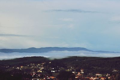 Aerial view of cityscape against sky