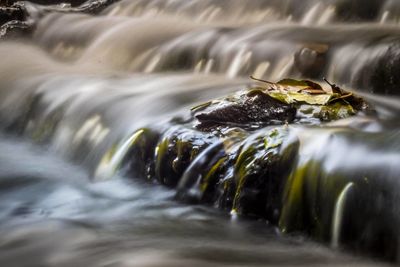 Close-up of water flowing in river