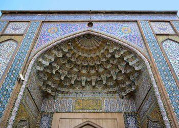 Low angle view of ornate ceiling of building