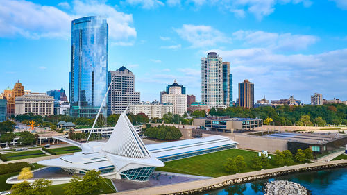 Modern buildings in city against sky