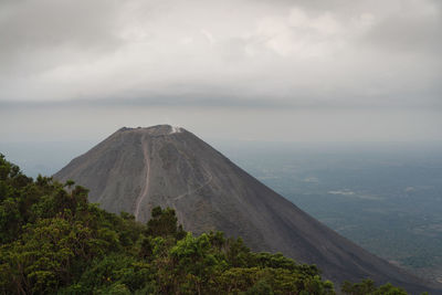 Scenic view of volcanic mountain against sky