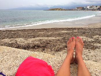 Low section of woman on beach