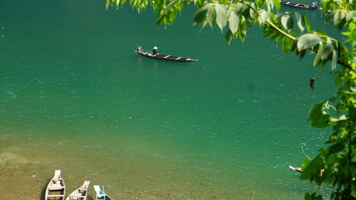High angle view of people on lake