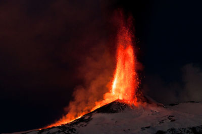 Bonfire against sky at night