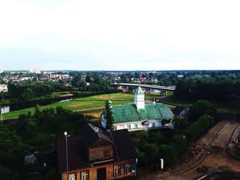 High angle view of buildings in city against sky