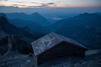 Scenic view of mountains against sky during sunset