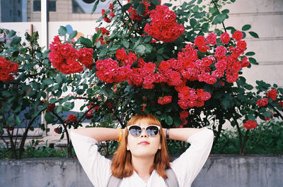 Close-up of woman with flowers