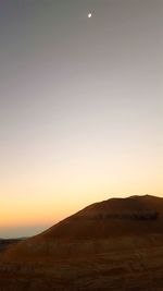 Scenic view of silhouette landscape against sky during sunset