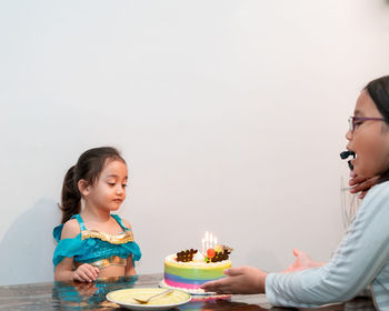 Surprise birthday cake to the little girl at home. celebrate birthday at home