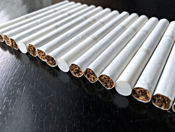 High angle view of cigarettes on table