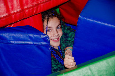 Low angle view of woman with umbrella