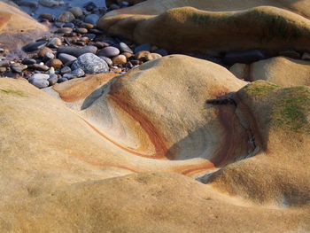 Close-up of pebbles on beach