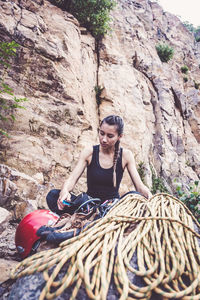 Full length of woman on rock