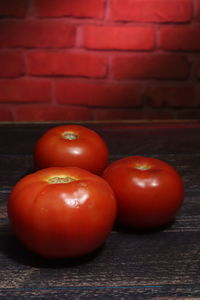 Close-up of tomatoes on table