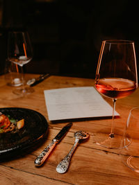 Close-up of wineglass on table