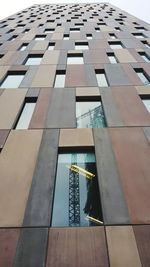 Low angle view of modern building against sky