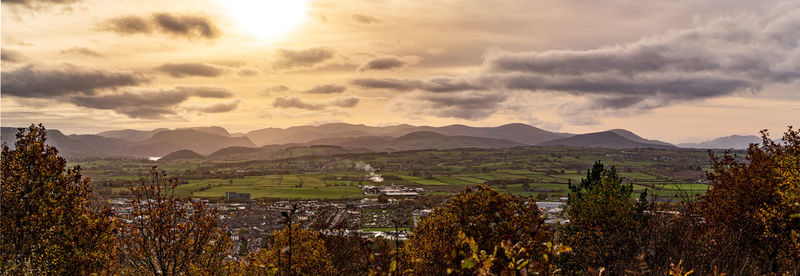 Scenic view of landscape against sky during sunset