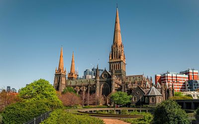Low angle view of cathedral against clear blue sky