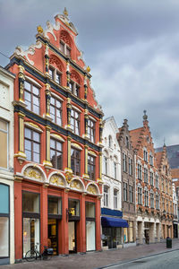 Street with historical houses in bruges city center, belgium