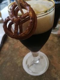 Close-up of beer glass on table