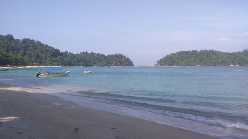 Scenic view of beach against sky