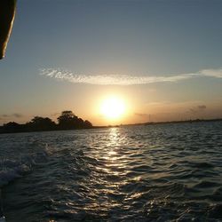 Sun shining over sea