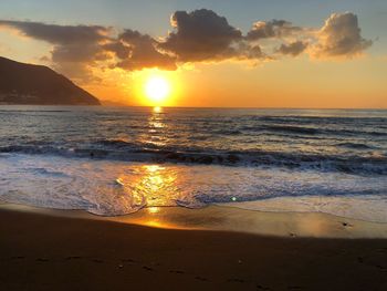 Scenic view of sea against sky during sunset