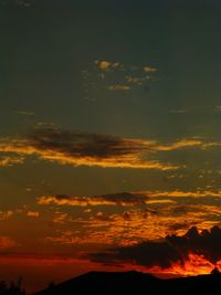 Low angle view of dramatic sky during sunset