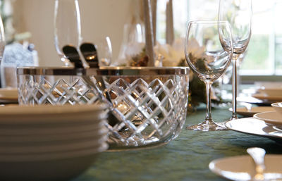 Close-up of glass container on table in restaurant