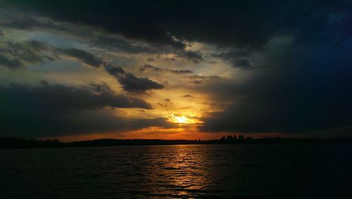 Scenic view of sea at sunset