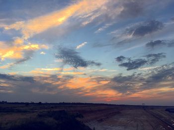 Road against sky during sunset