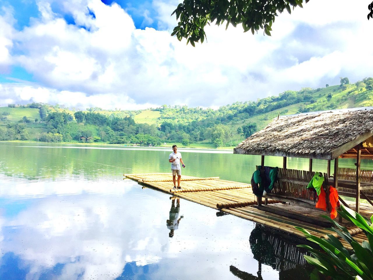 water, sky, real people, tree, cloud - sky, nature, day, full length, beauty in nature, outdoors, men, scenics, lake, growth, mountain, standing, women, one person, architecture, people