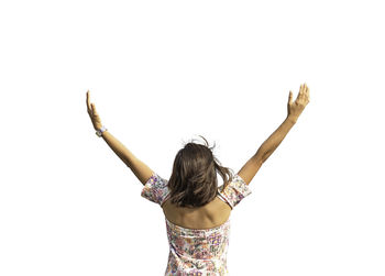 Rear view of woman standing against white background