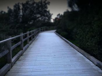 Footbridge amidst trees