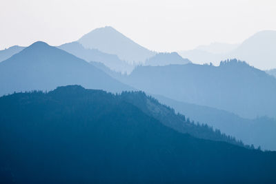 Scenic view of mountains in foggy weather