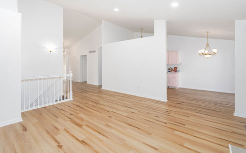 New hard wood flooring has been installed in a renovated home