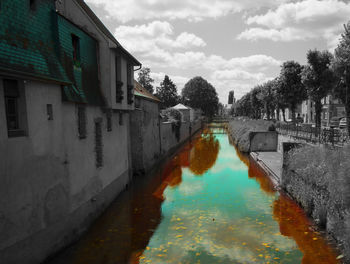 View of canal with buildings in background