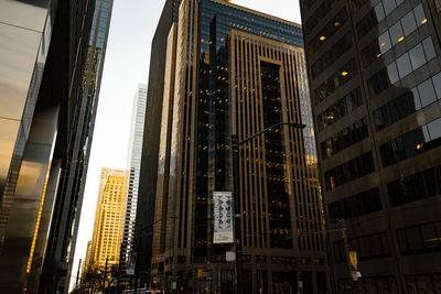 Low angle view of modern buildings in city