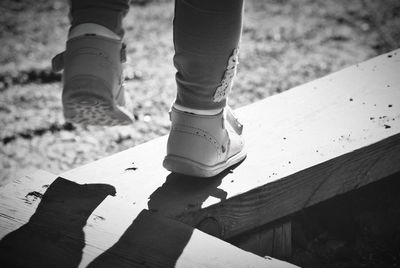 Low section of girl standing outdoors