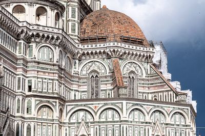 Low angle view of duomo santa maria del fiore against sky in city