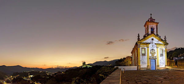 Low angle view of church against sky during sunset