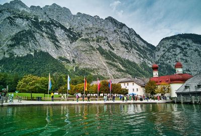 Scenic view of lake and mountains against sky