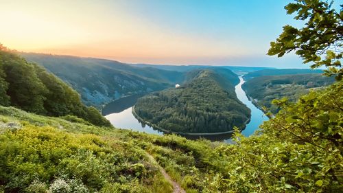 Scenic view of mountains against sky during sunset