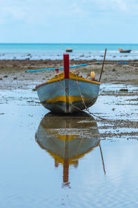 Fishing boats. parking on the sea beach. in the daytime sky