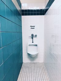 Urinal in public restroom