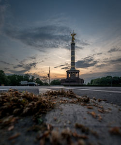 View of tower against cloudy sky