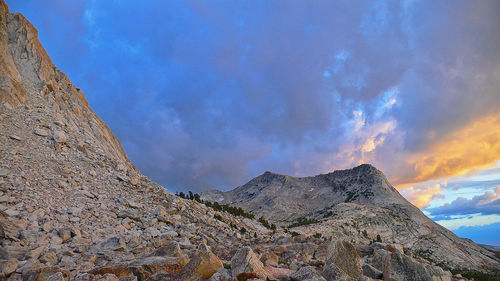 Low angle view of mountain against sky during sunset