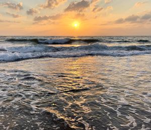 Scenic view of sea against sky during sunset