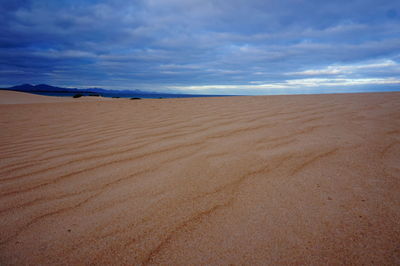 Scenic view of desert against sky