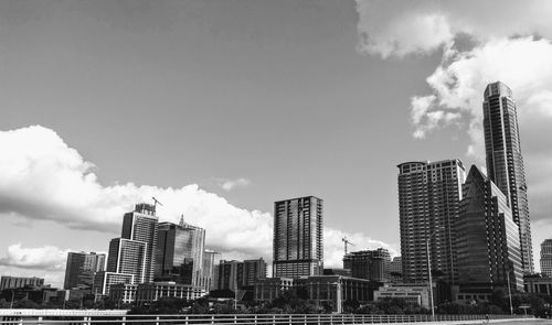 Buildings in city against sky